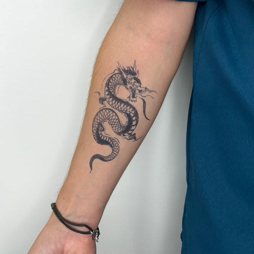 tatouage dragon jagua bras