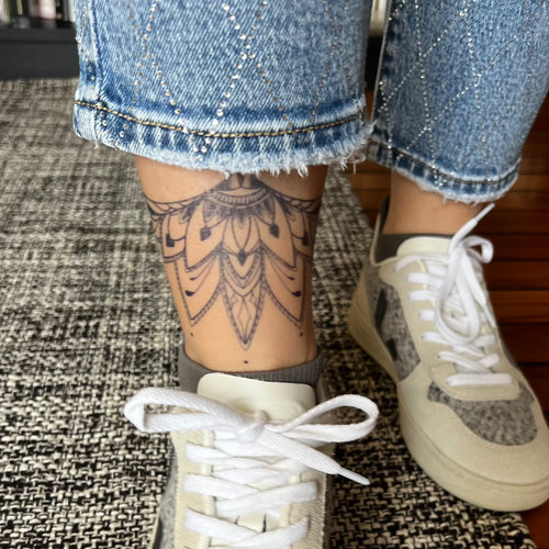 Onderborst tatoeage