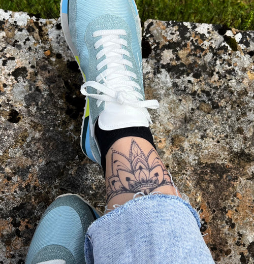 Onderborst tatoeage