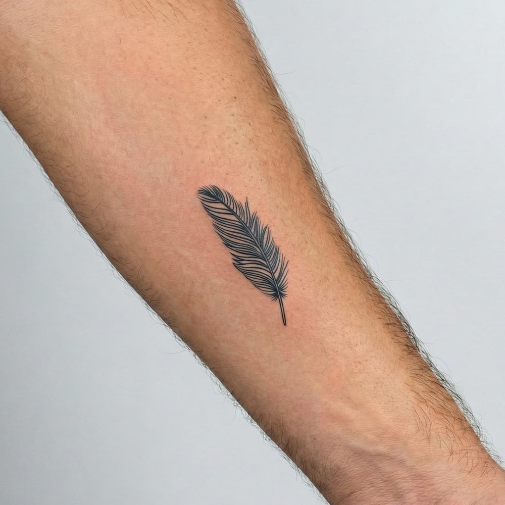 Tatouage homme plume signification liberté et nouveau départ