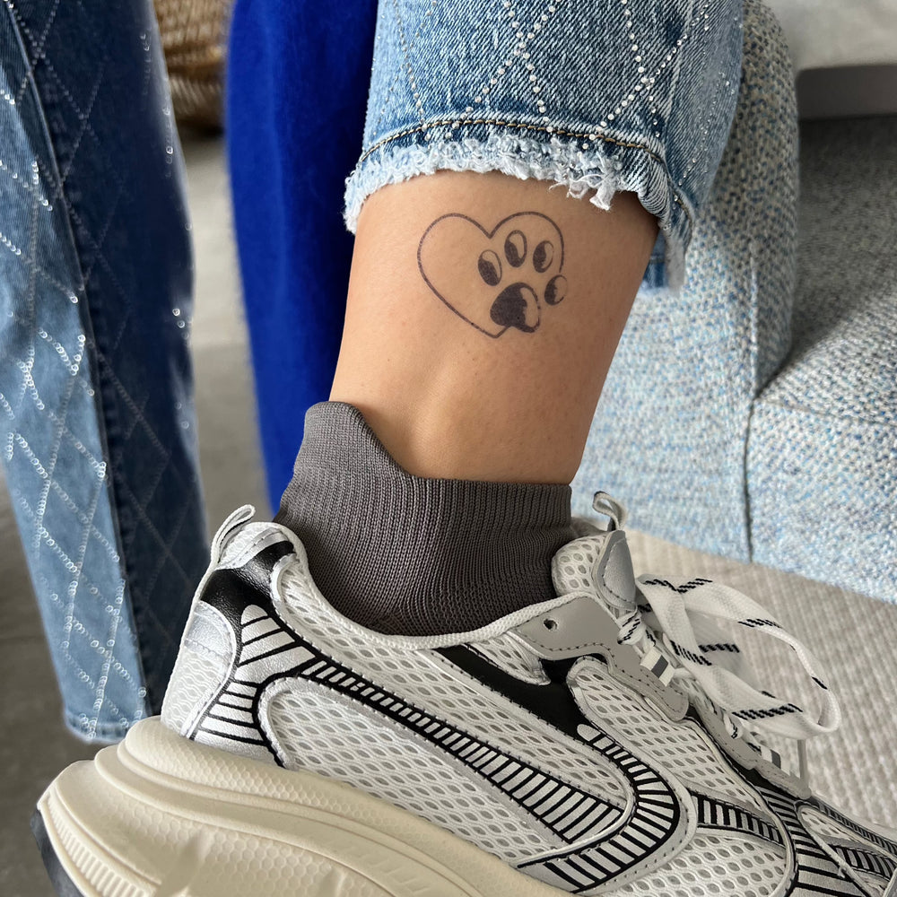 Hondenpoot tattoo