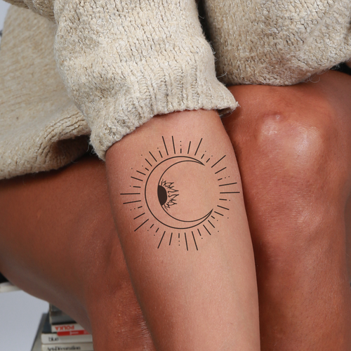 Zon en maan tattoo