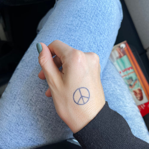 Vrede en liefde tattoo
