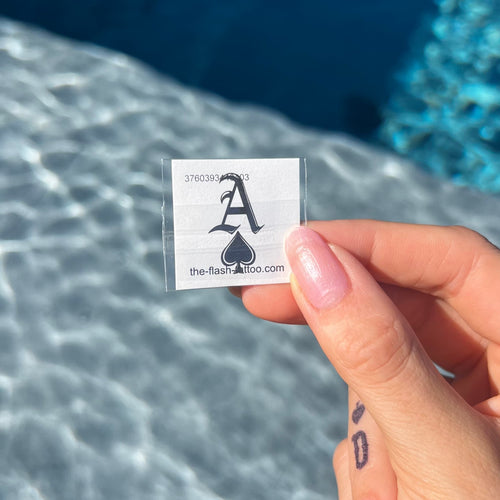 Tatouage éphémère as de pique minimaliste